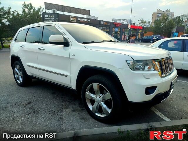 Білий Джип Grand Cherokee, об'ємом двигуна 3 л та пробігом 285 тис. км за 12800 $, фото 1 на Automoto.ua