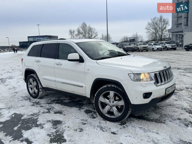 Білий Джип Grand Cherokee, об'ємом двигуна 3 л та пробігом 180 тис. км за 12800 $, фото 1 на Automoto.ua