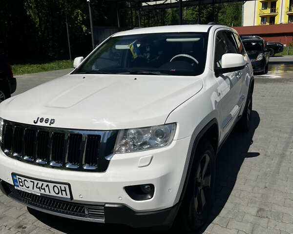 Білий Джип Grand Cherokee, об'ємом двигуна 2.99 л та пробігом 245 тис. км за 17550 $, фото 1 на Automoto.ua