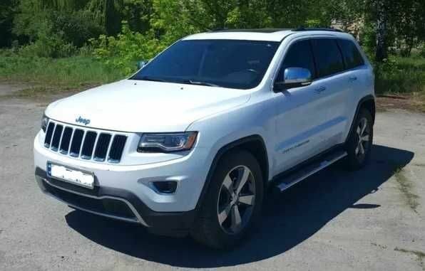 Белый Джип Гранд Чероки, объемом двигателя 3 л и пробегом 180 тыс. км за 10000 $, фото 1 на Automoto.ua