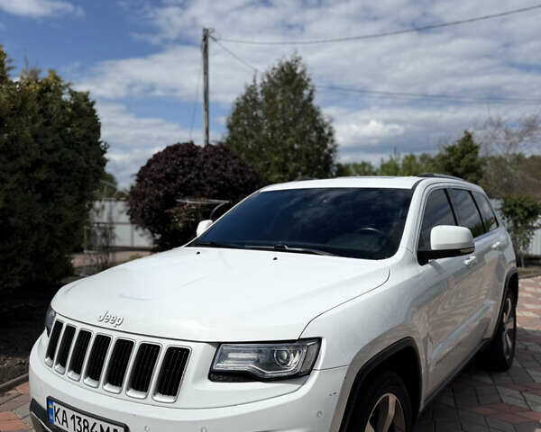 Белый Джип Гранд Чероки, объемом двигателя 2.99 л и пробегом 228 тыс. км за 19500 $, фото 1 на Automoto.ua