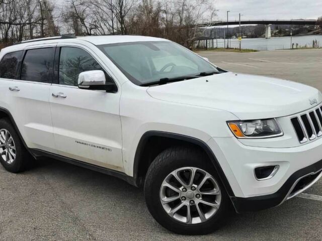 Білий Джип Grand Cherokee, об'ємом двигуна 5.7 л та пробігом 88 тис. км за 13000 $, фото 1 на Automoto.ua