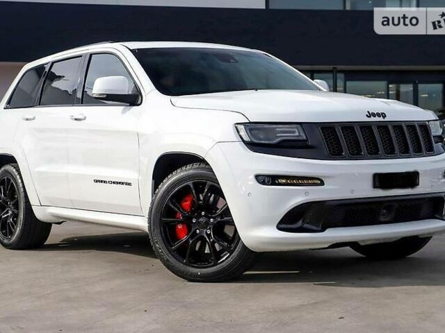 Білий Джип Grand Cherokee, об'ємом двигуна 6.4 л та пробігом 78 тис. км за 44000 $, фото 1 на Automoto.ua