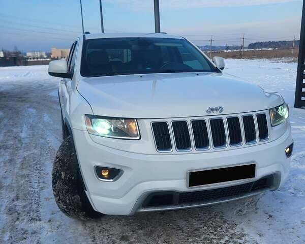Белый Джип Гранд Чероки, объемом двигателя 3.6 л и пробегом 245 тыс. км за 16000 $, фото 1 на Automoto.ua