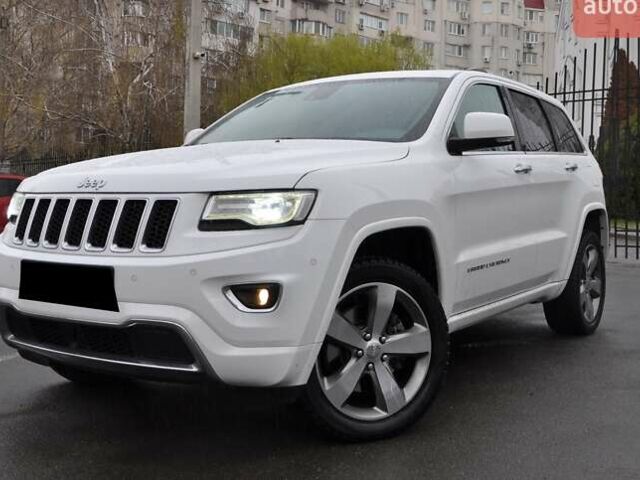 Белый Джип Гранд Чероки, объемом двигателя 2.99 л и пробегом 122 тыс. км за 20000 $, фото 1 на Automoto.ua