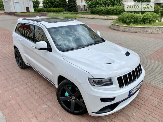 Білий Джип Grand Cherokee, об'ємом двигуна 5.7 л та пробігом 84 тис. км за 35000 $, фото 1 на Automoto.ua