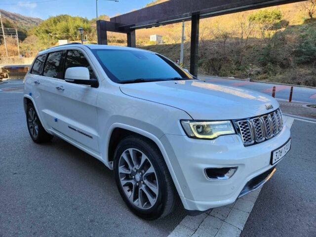 Білий Джип Grand Cherokee, об'ємом двигуна 3 л та пробігом 107 тис. км за 25100 $, фото 1 на Automoto.ua