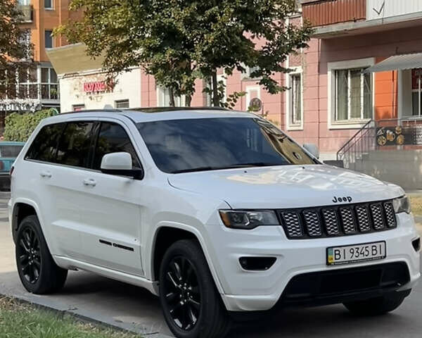 Белый Джип Гранд Чероки, объемом двигателя 3.6 л и пробегом 135 тыс. км за 23000 $, фото 1 на Automoto.ua