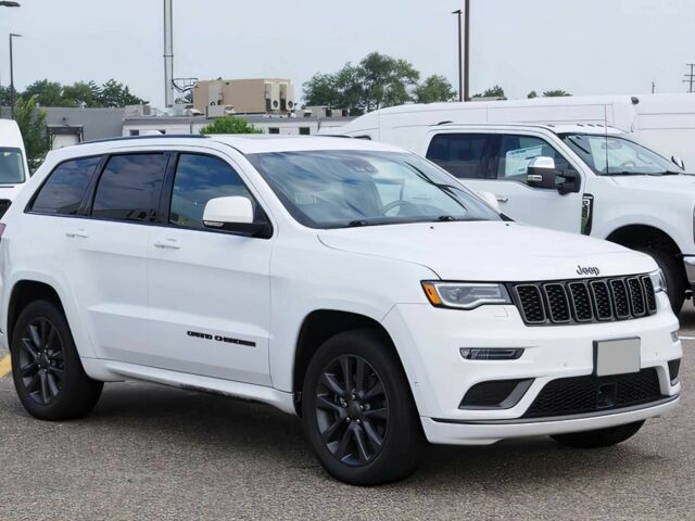 Білий Джип Grand Cherokee, об'ємом двигуна 5.7 л та пробігом 65 тис. км за 6000 $, фото 1 на Automoto.ua