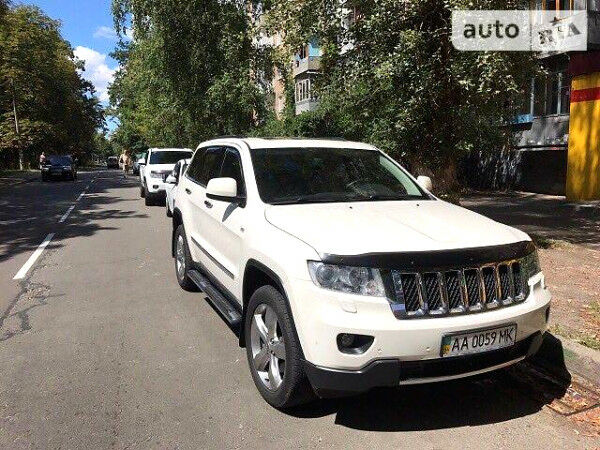 Білий Джип Grand Cherokee, об'ємом двигуна 3 л та пробігом 105 тис. км за 29999 $, фото 1 на Automoto.ua