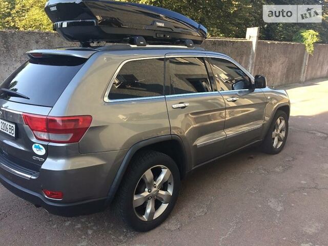 Бронзовий Джип Grand Cherokee, об'ємом двигуна 3 л та пробігом 163 тис. км за 22000 $, фото 1 на Automoto.ua