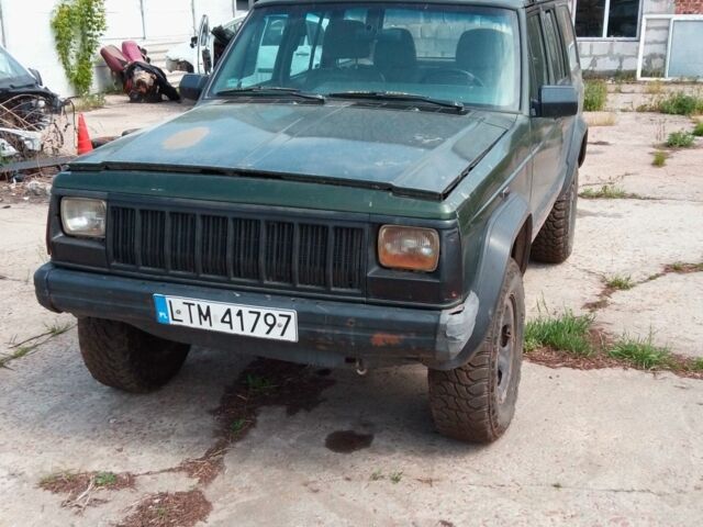 Чорний Джип Grand Cherokee, об'ємом двигуна 2.5 л та пробігом 349 тис. км за 2000 $, фото 1 на Automoto.ua
