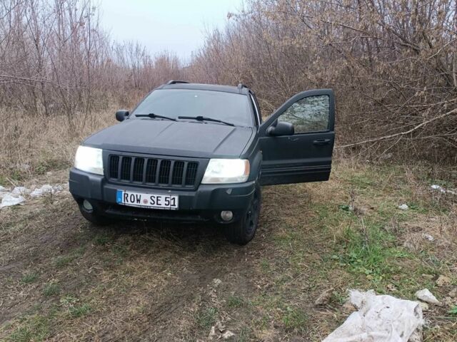 Черный Джип Гранд Чероки, объемом двигателя 2.7 л и пробегом 380 тыс. км за 4700 $, фото 1 на Automoto.ua