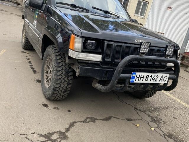 Чорний Джип Grand Cherokee, об'ємом двигуна 4 л та пробігом 500 тис. км за 4000 $, фото 1 на Automoto.ua