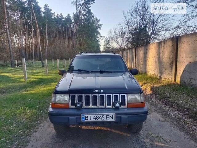 Чорний Джип Grand Cherokee, об'ємом двигуна 4 л та пробігом 300 тис. км за 4000 $, фото 1 на Automoto.ua