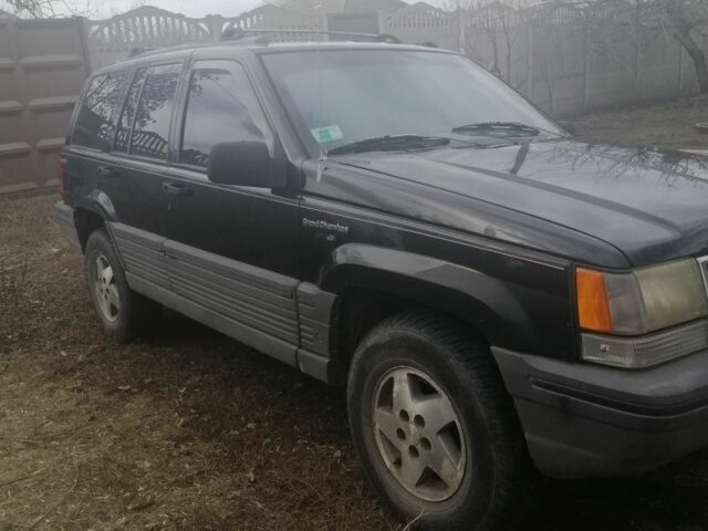 Чорний Джип Grand Cherokee, об'ємом двигуна 4 л та пробігом 168 тис. км за 4945 $, фото 1 на Automoto.ua