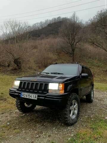 Черный Джип Гранд Чероки, объемом двигателя 5.2 л и пробегом 330 тыс. км за 5900 $, фото 1 на Automoto.ua