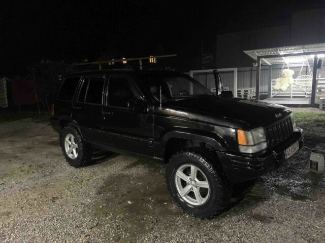 Черный Джип Гранд Чероки, объемом двигателя 5.2 л и пробегом 345 тыс. км за 5900 $, фото 1 на Automoto.ua