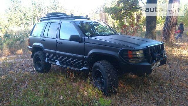 Чорний Джип Grand Cherokee, об'ємом двигуна 0 л та пробігом 201 тис. км за 9000 $, фото 1 на Automoto.ua