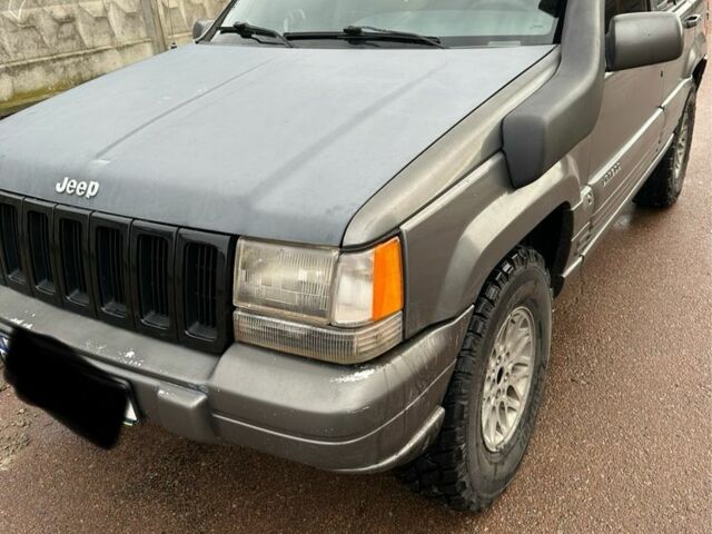Чорний Джип Grand Cherokee, об'ємом двигуна 4 л та пробігом 300 тис. км за 4399 $, фото 1 на Automoto.ua