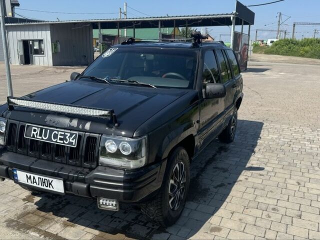 Чорний Джип Grand Cherokee, об'ємом двигуна 2.5 л та пробігом 1 тис. км за 3000 $, фото 1 на Automoto.ua