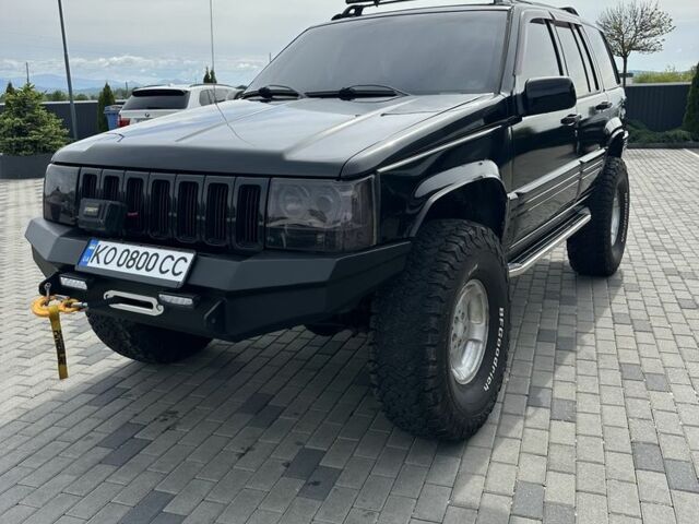 Черный Джип Гранд Чероки, объемом двигателя 5.2 л и пробегом 300 тыс. км за 7500 $, фото 1 на Automoto.ua