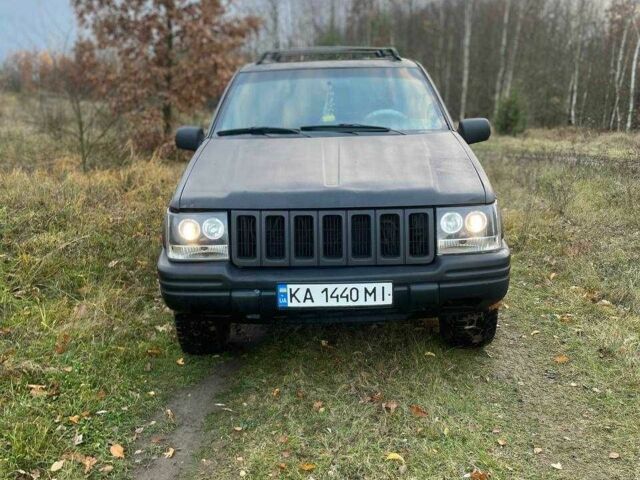 Черный Джип Гранд Чероки, объемом двигателя 4 л и пробегом 400 тыс. км за 2900 $, фото 1 на Automoto.ua