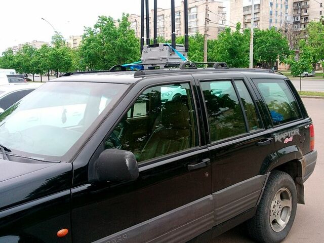 Черный Джип Гранд Чероки, объемом двигателя 2.5 л и пробегом 111 тыс. км за 3200 $, фото 1 на Automoto.ua