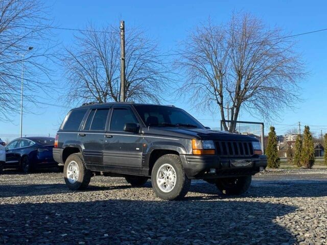 Чорний Джип Grand Cherokee, об'ємом двигуна 0.25 л та пробігом 428 тис. км за 7000 $, фото 1 на Automoto.ua