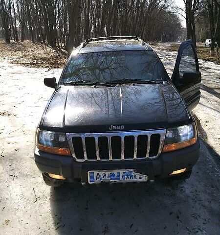 Чорний Джип Grand Cherokee, об'ємом двигуна 4 л та пробігом 227 тис. км за 7200 $, фото 1 на Automoto.ua