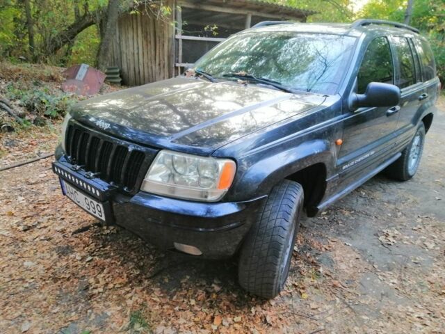 Чорний Джип Grand Cherokee, об'ємом двигуна 3.2 л та пробігом 320 тис. км за 2999 $, фото 1 на Automoto.ua