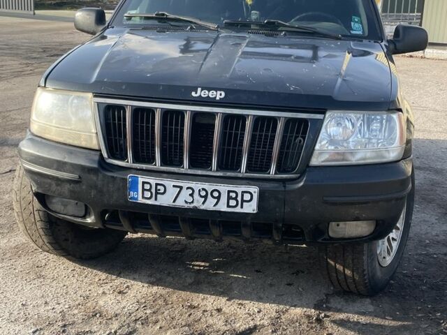 Черный Джип Гранд Чероки, объемом двигателя 3.1 л и пробегом 280 тыс. км за 3000 $, фото 1 на Automoto.ua