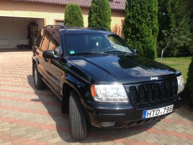 Чорний Джип Grand Cherokee, об'ємом двигуна 4 л та пробігом 22 тис. км за 6500 $, фото 1 на Automoto.ua