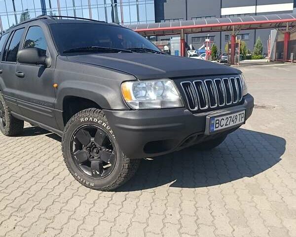 Черный Джип Гранд Чероки, объемом двигателя 3.12 л и пробегом 257 тыс. км за 7200 $, фото 1 на Automoto.ua
