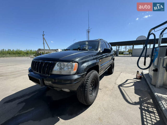 Чорний Джип Grand Cherokee, об'ємом двигуна 3.12 л та пробігом 339 тис. км за 7500 $, фото 1 на Automoto.ua