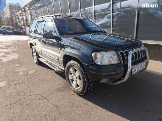 Чорний Джип Grand Cherokee, об'ємом двигуна 4.7 л та пробігом 350 тис. км за 6999 $, фото 1 на Automoto.ua