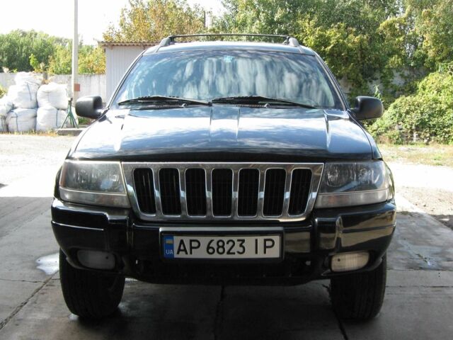 Чорний Джип Grand Cherokee, об'ємом двигуна 3.1 л та пробігом 223 тис. км за 8000 $, фото 1 на Automoto.ua