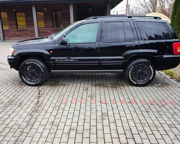 Черный Джип Гранд Чероки, объемом двигателя 2.69 л и пробегом 350 тыс. км за 5500 $, фото 1 на Automoto.ua