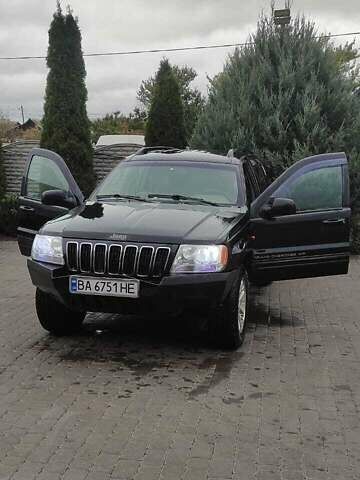 Чорний Джип Grand Cherokee, об'ємом двигуна 2.69 л та пробігом 409 тис. км за 6750 $, фото 1 на Automoto.ua