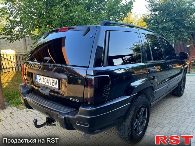 Джип Гранд Чероки 2002 в Днепре (Днепропетровске) на Automoto.ua Черный Джип Гранд Чероки, объемом двигателя 2.7 л и пробегом 300 тыс. км за 5000 $, фото 1 на Automoto.ua