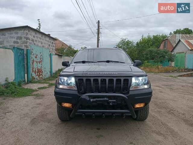 Чорний Джип Grand Cherokee, об'ємом двигуна 2.69 л та пробігом 265 тис. км за 9400 $, фото 1 на Automoto.ua