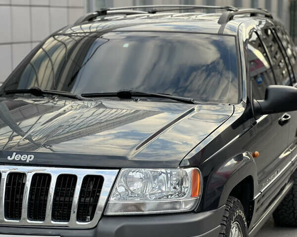 Чорний Джип Grand Cherokee, об'ємом двигуна 2.69 л та пробігом 350 тис. км за 8000 $, фото 1 на Automoto.ua