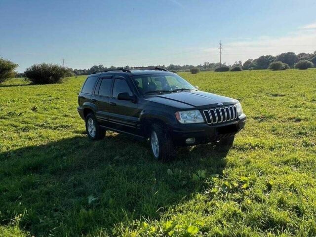 Черный Джип Гранд Чероки, объемом двигателя 0 л и пробегом 300 тыс. км за 7400 $, фото 1 на Automoto.ua