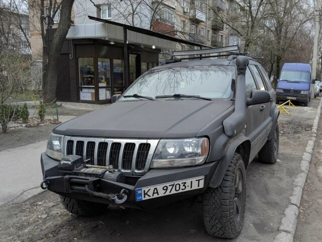 Чорний Джип Grand Cherokee, об'ємом двигуна 4.7 л та пробігом 240 тис. км за 9000 $, фото 1 на Automoto.ua