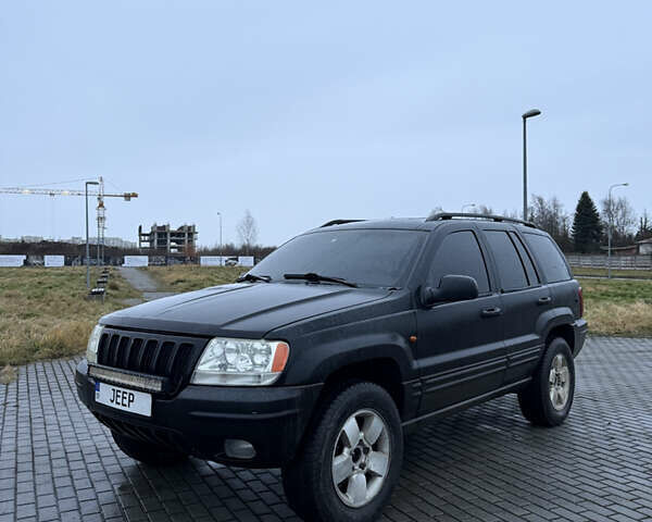 Чорний Джип Grand Cherokee, об'ємом двигуна 2.69 л та пробігом 300 тис. км за 9300 $, фото 1 на Automoto.ua