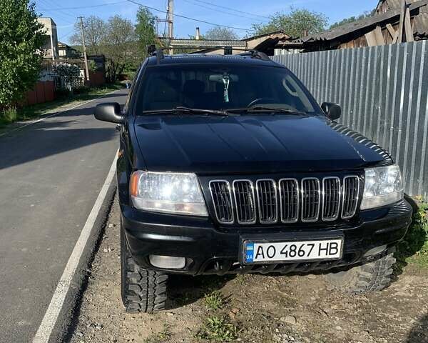 Чорний Джип Grand Cherokee, об'ємом двигуна 2.69 л та пробігом 380 тис. км за 9300 $, фото 1 на Automoto.ua