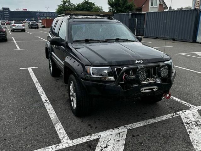 Черный Джип Гранд Чероки, объемом двигателя 2.7 л и пробегом 3 тыс. км за 4500 $, фото 1 на Automoto.ua