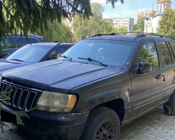 Джип Гранд Чероки 2003 в Новоукраинке на Automoto.ua Черный Джип Гранд Чероки, объемом двигателя 2.69 л и пробегом 280 тыс. км за 4100 $, фото 1 на Automoto.ua