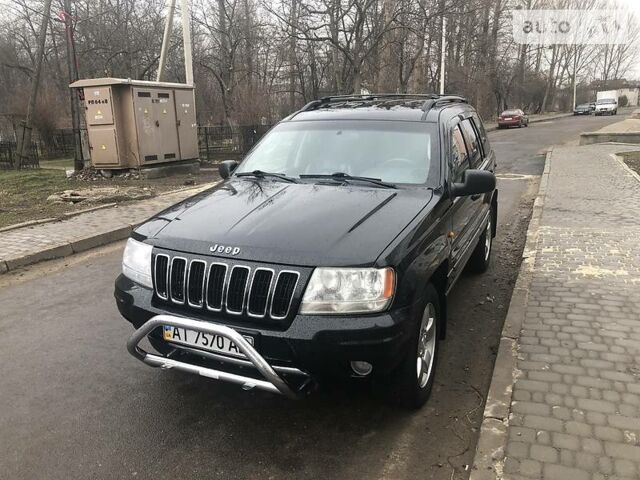 Чорний Джип Grand Cherokee, об'ємом двигуна 2.7 л та пробігом 190 тис. км за 10000 $, фото 1 на Automoto.ua