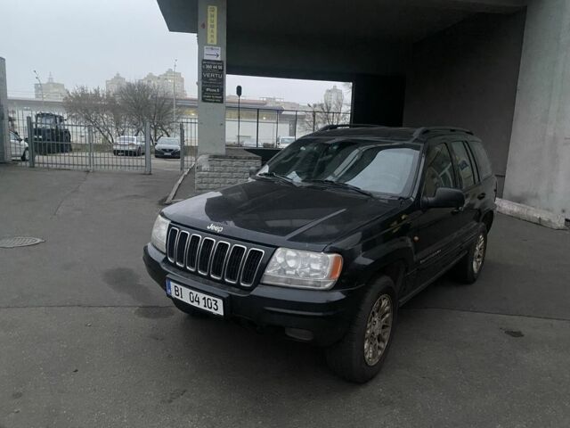 Черный Джип Гранд Чероки, объемом двигателя 2.7 л и пробегом 345 тыс. км за 4999 $, фото 1 на Automoto.ua